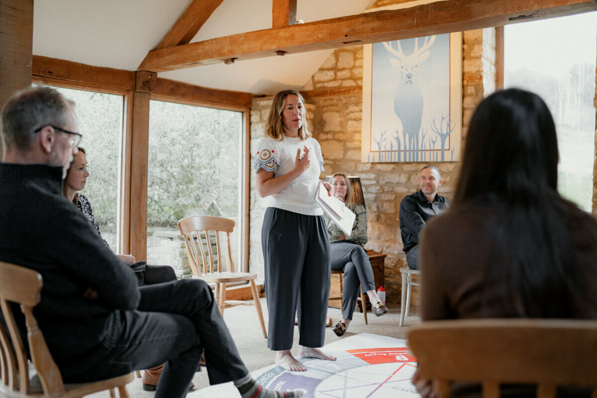 Lucy Dennis, CoCreator, in a team discussion