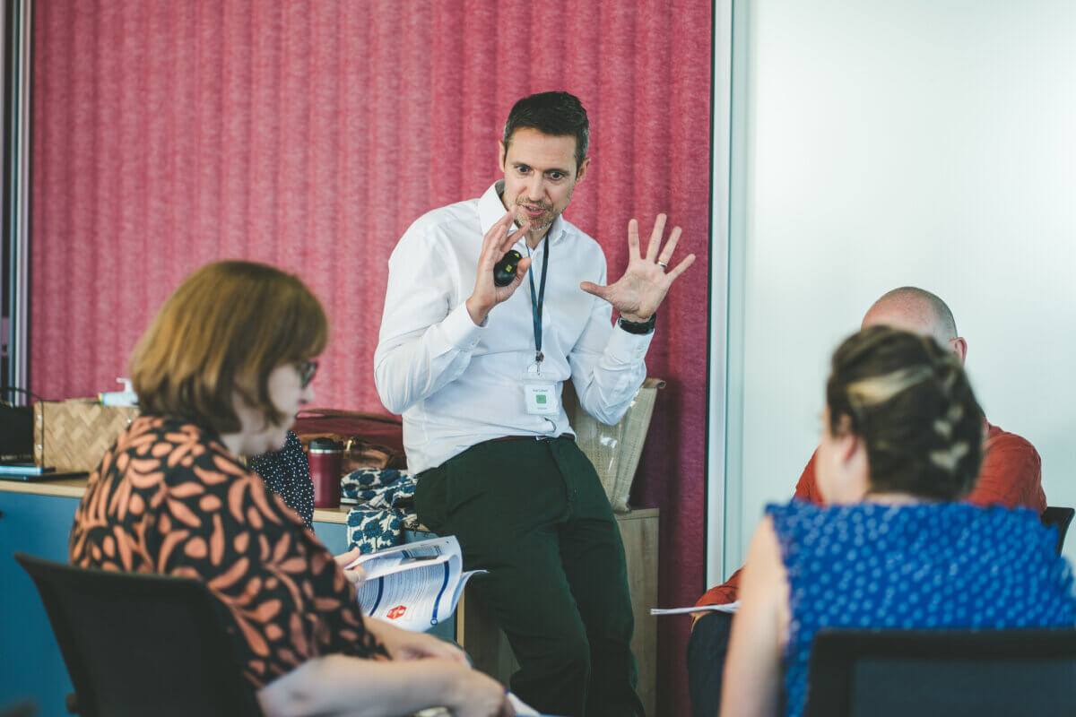 CoCreate Founder, Andy Caldwell, speaking to Immediate Media's leadership team during an iEQ9 Enneagram session