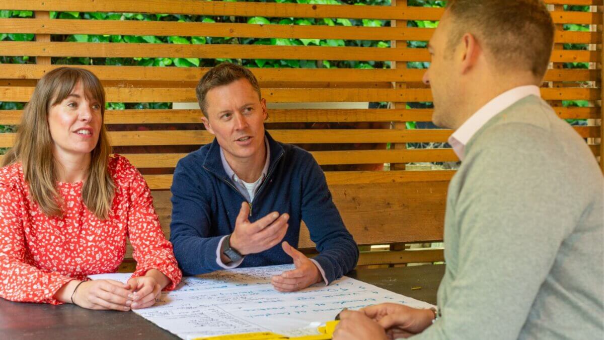 Tom James, Partner at CoCreate, speaking to two of our CoCreators